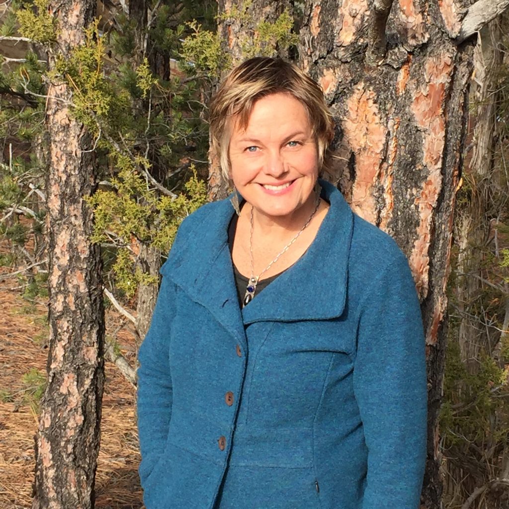 IMG_3559 Blair leaning against a tree with a ray of sun on her face